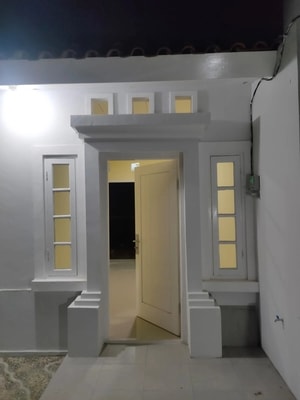 Tampak depan rumah tipe 30 berpagar di Jababeka Cikarang Bekasi