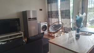 Foto Samping Ruang Tamu Sewa Rumah Lippo Cikarang Cluster Waterfront Silvercreek Full Furnish 3Kamar Tidur | Exera