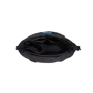 Blume Tote Bag hitam dari Into The Lume dengan hiasan tali biru berbentuk bunga, dengan compartment totebag stylish dan fungsional untuk daily use.